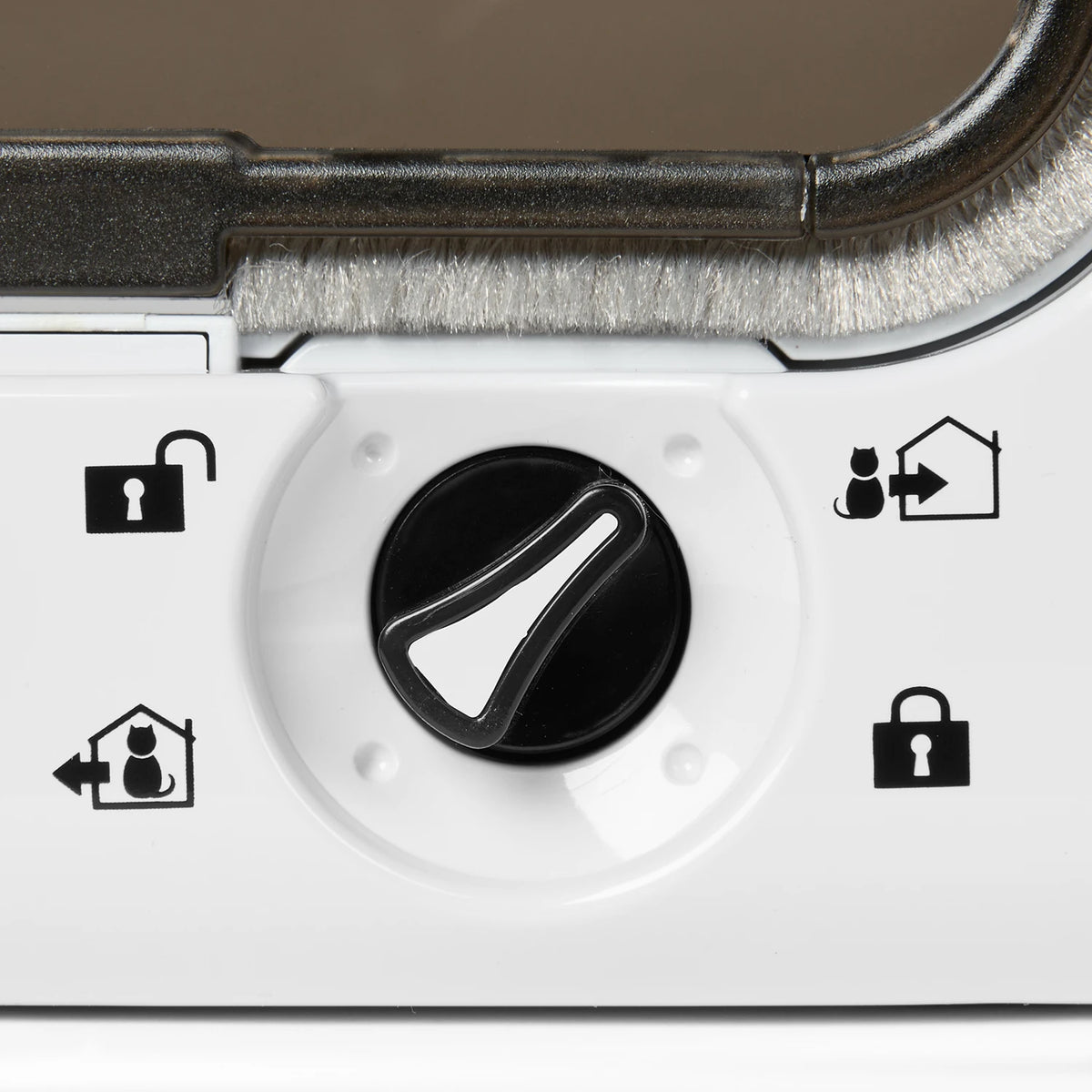 Control panel for the white cat flap with a knob and symbols on a white background
