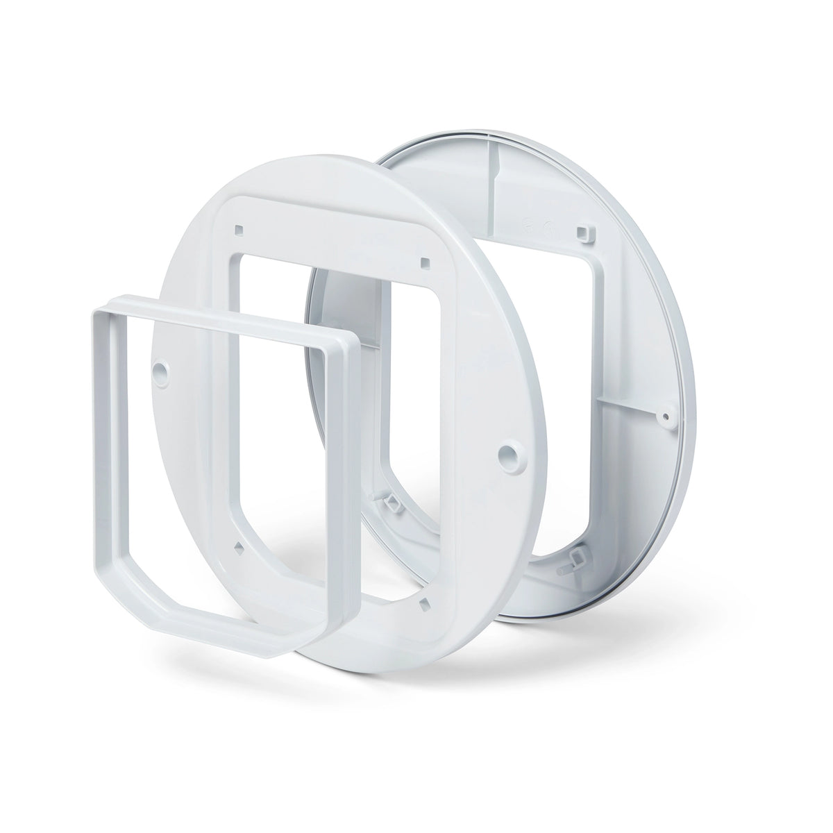 Two white circular plastic frames as part of the cat flap adaptor kit on a white background