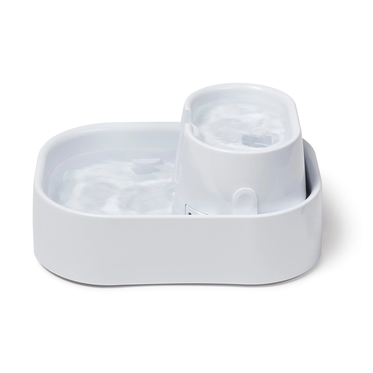 White pet water fountain on a white background