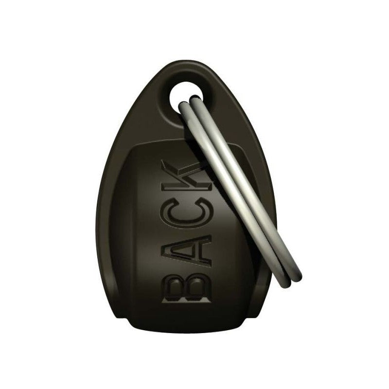 The back side of the black collar magnet with the O-ring folded down, against a white background.  